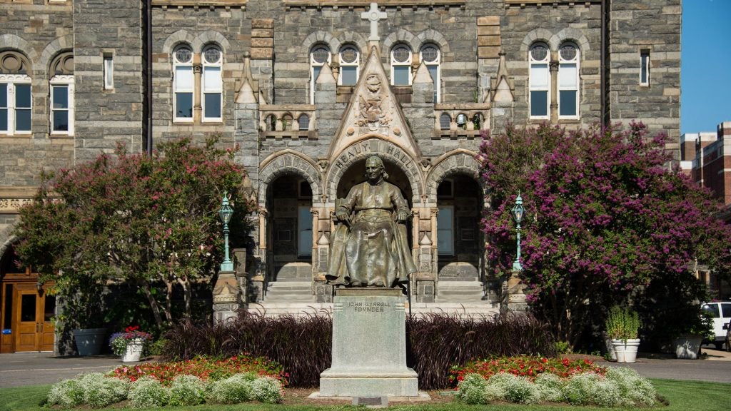 Healy Hall and John Carroll statue